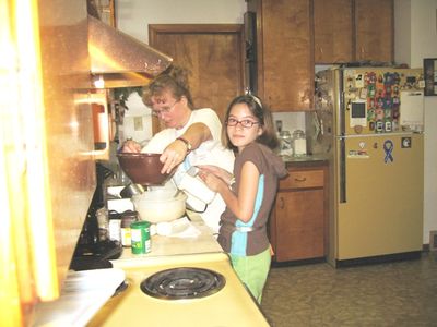 The People
Laurel Higham and (in back) Aunt Mary Higham Glazer prepare food for picnic.
