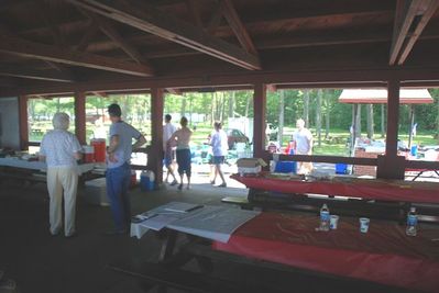 The Place, Preparation, and Food
Preparing for the Food Rush.  South Pavilion
