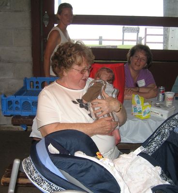 Great Aunt Betty and Eli
L to r: Betty Higham Sauerzopf holding eli Glazer; Ann Higham Hughes and Susan Higham Foley look on.
