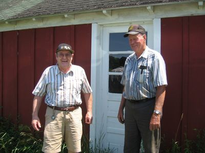 Dave Smith and Family Visit Camden Tour 1
Dave and high school classmate, Dan Dale, at the Dale farm in front of Dan's maple sugar facility.
