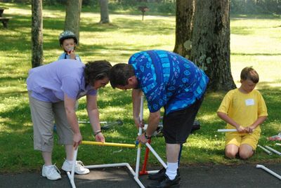 Reunion 2010
Sue and Joe try to get the game figured out.  Sam Hughes (background) and Joe Hughes help.
