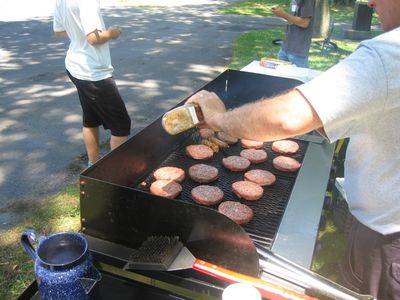 Reunion 2010 Chefs at Work
The chef's touch!  Delicious burgers on the way!
