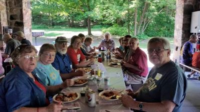 2015 Family Reunion, July 11, 2015
L to R: Mary Smith Taglieri; Betty Higham Sauerzopf; Bob Sauerzopf; Florie Parmelee; Miriam Smith Parmelee; Chris Curtiss-Rivers; Jane Curtiss Watkin; partially hidden, Evelyn Grinnel Smith and Dave Smith; Sheri Smith Diefenbacher; Clive Diefenbacher; Richard Taglieri 
