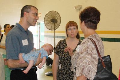 Sunday Party at OLS School
Guests: Mark (holding Eli), and Mary Higham Glazer greet Jo Jennings
