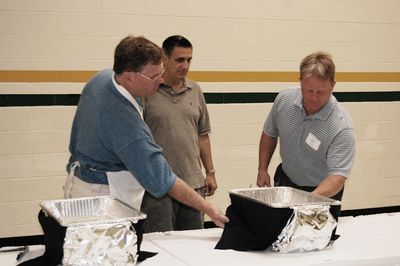 Sunday Party at OLS School
Food Prep.  Ted Foley, Tim Sansone, and Jim Higham set up for the buffet.
