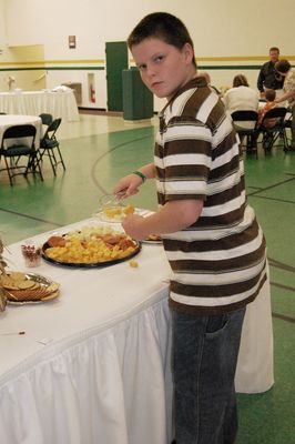 Sunday Party at OLS School
Guests: Nick Higham checks out the appetizers.
