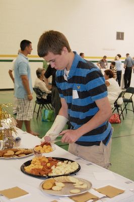 Sunday Party at OLS School
Guests: Arik Foley checks out the appetizers
