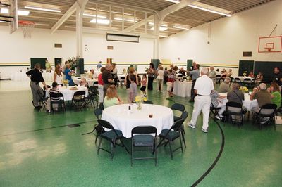 Sunday Party at OLS School
Food Buffet Jim Higham gives traffic directions to the food.
