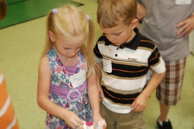 Sunday Party at OLS School
Games: Madison Higham and Sam Hughes open gifts.
