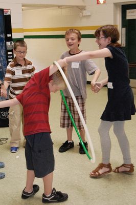 Sunday Party at OLS School
Games: Justin; Thomas; Tyler and Laurel "hoop" it up!
