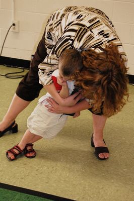 Sunday Party at OLS School
Guests: Cole gets a hug from Aunt Jane.
