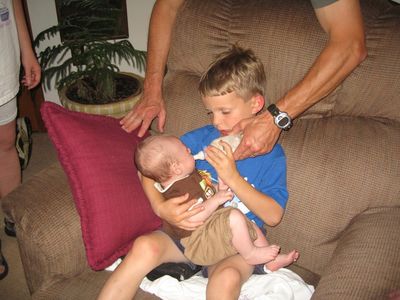 Friday/Saturday Breakfast and Picnic
Picnic: Sam Hughes feeds Eli Glazer with some help from above.
