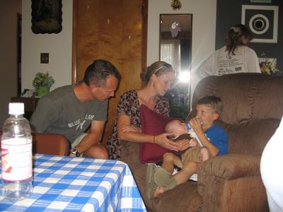 Friday/Saturday Breakfast and Picnic
Picnic: Ben and Ann Hughes watch as Sam feeds Eli.
