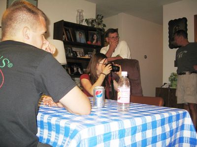 Friday/Saturday Breakfast and Picnic
Picnic: Andy watches as Rachel takes more pix.  Ted Foley and Ben Hughes (background) in Living Room. 
