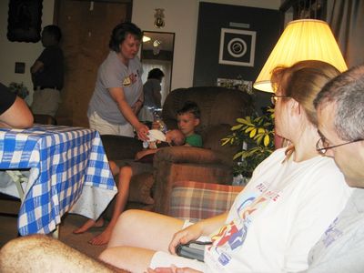 Friday/Saturday Breakfast and Picnic
Picnic: Mark and Mary watch Sam Hughes feed Eli with assistance from Sue Foley
