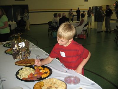 Sunday Party at OLS School
Guests: Justin Entwistle checks out the appetizers.
