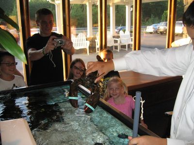 Thursday Trip Home
Night out at red Lobster: "Smile, Larry!: Jake shoots as Julia and Madison watch.  Thomas in left background.
