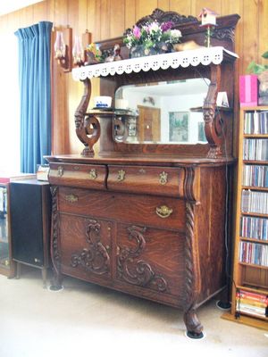 Higham Family
Higham Dining Room Sideboard.
Origin uncertain.  May have been at 418 Floyd Ave., Rome, NY.
Was in possession of W. Ray and Mary Higham, then Wilfred and Mildred Higham, now at the Jack and Jan Higham residence, Vestal, NY.  It accompanies the Higham Oak Dining Table.
