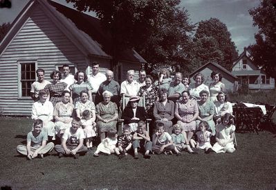 Seubert / Costello / Higham/ Smith Family
Family Reunion at Costello Home, Camden, Sunday, August 15, 1948 as per diary of Mary Seubert Higham.  She reports 39 attending.  34 in the photo, plus the photographer.  
(Missing: Don Seubert, George Costello and three more.  Possibles: Patricia Anna Seubert; Richard Karl Seubert; David Christopher Burch)
Front: Bill Smith; Jack Higham; Mary Elizabeth Burch; Raymond Donald Burch; Steve Smith; Dave Smith; Roberta Smith; Ruthanne Smith; Betty Higham;
Seated: Virginia Seubert Burch; Mary Seubert Higham; Julia Seubert Costello, holding Diane Costello; Cora Clark Costello, (Gerald's mother); Florence Ward Seubert, (Virginia's mother); Unkn woman; Alice Higham; Magdalena Fauser Seubert; Anna Shephard Costello, holding Michael David Costello?;
Standing: Merritt Smith; Mary Lou Costello Maynard; Bill Maynard; Nellie Higham Smith; Don Burch; Ray Higham; Gerald Costello; Paul Seubert; Mildred Walker Higham; Mary Arma Smith held by Ralph Smith; Marie Scoville Seubert; Jane Higham Smith; Barbara Costello
Photo taken by Wilfred Higham, using early Kodachrome cut film
