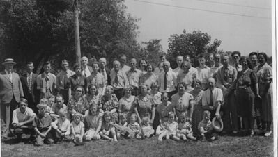 Walker Reunion 1940
Walker Family Reunion
Edgewater Park, Sylvan Beach, probably in Summer of 1941

Seated on Ground, L to R: Art DelaRoche; Ernie DelaRoche; Edith Mildred DelaRoche; Edna DelaRoche; Carol Russell; Howard â€œSkipâ€ Grinnell; Eddie Caldwell; Bertha DelaRoche; Betty Higham; Peggy Walker; Jack Higham;

Kneeling: George DelaRoche; Elsie DelaRoche Grinnell, holding Barbara Grinnell; Howard Grinnell; Emma Newman Walker; Charlotte Walker Caldwell; Bertha Walker Russell; Leona Walker Barreda; Edith Walker DelaRoche; Elsie Walker Watkins; Mary DelaRoche; Mildred Walker Higham; Marjorie Walker Weber; Arthur Walker;

Standing: Elwin Walker; Glen Waterman; Edward Caldwell; Herman DelaRoche; Rita Hannay Walker; Ernest Walker; Ruth Walker Waterman;  Charles Walker; William Russell; Bill Russell; Elmer Walker; Muriel Katzenburg Walker; Alice Walker; Almina Walker; John Walker; Wallace Walker; Fred Watkins; Grace Walker Lavender; John Lavender; Wayne Watkins; Herman â€œHermieâ€ DelaRoche; Elmer William Walker; Elwin Hugh Walker;  William Weber; Edna Swetman Walker; Wilfred Higham; Anna Collins
